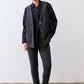 Charcoal longline herringbone vest with notch lapels and two gold buttons