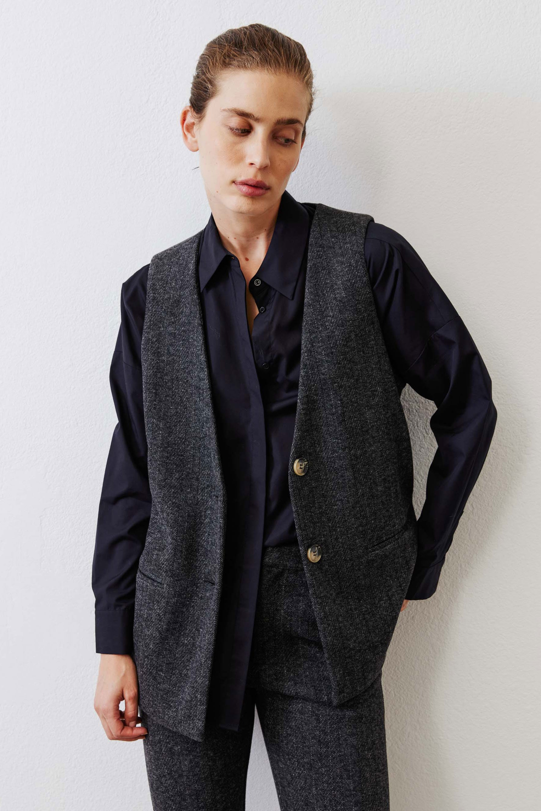 Charcoal herringbone longline vest with gold button front