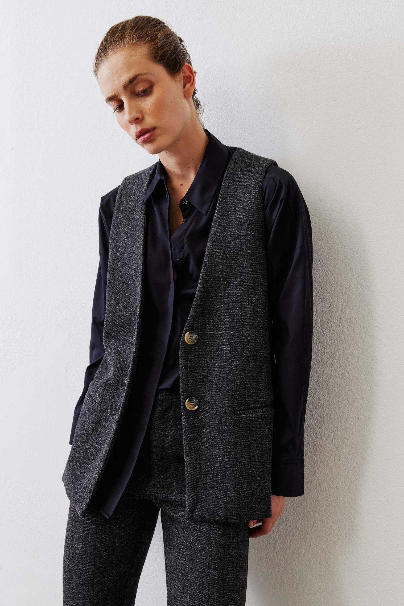 Charcoal relaxed longline herringbone vest with gold button placket