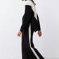 Chevron colorblock knit sweater, forest green center with cream V and black side panels.