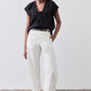 Black cinched V-neck poplin top with short sleeves, front full-length view