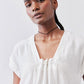 White cinched-neck poplin top with drawstring, short batwing sleeves