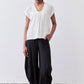 White cinched-neck poplin top with drawstring, short sleeves, relaxed drape