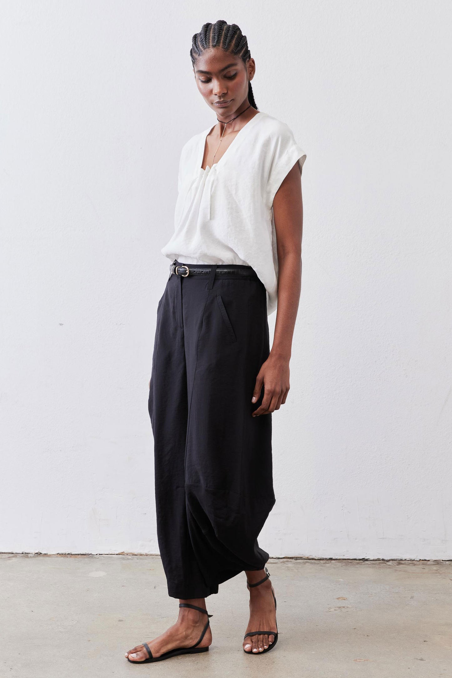 White cinched-neck poplin top with drawstring, short sleeves, side view