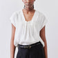 White poplin top with cinched neckline and drawstring, short sleeves