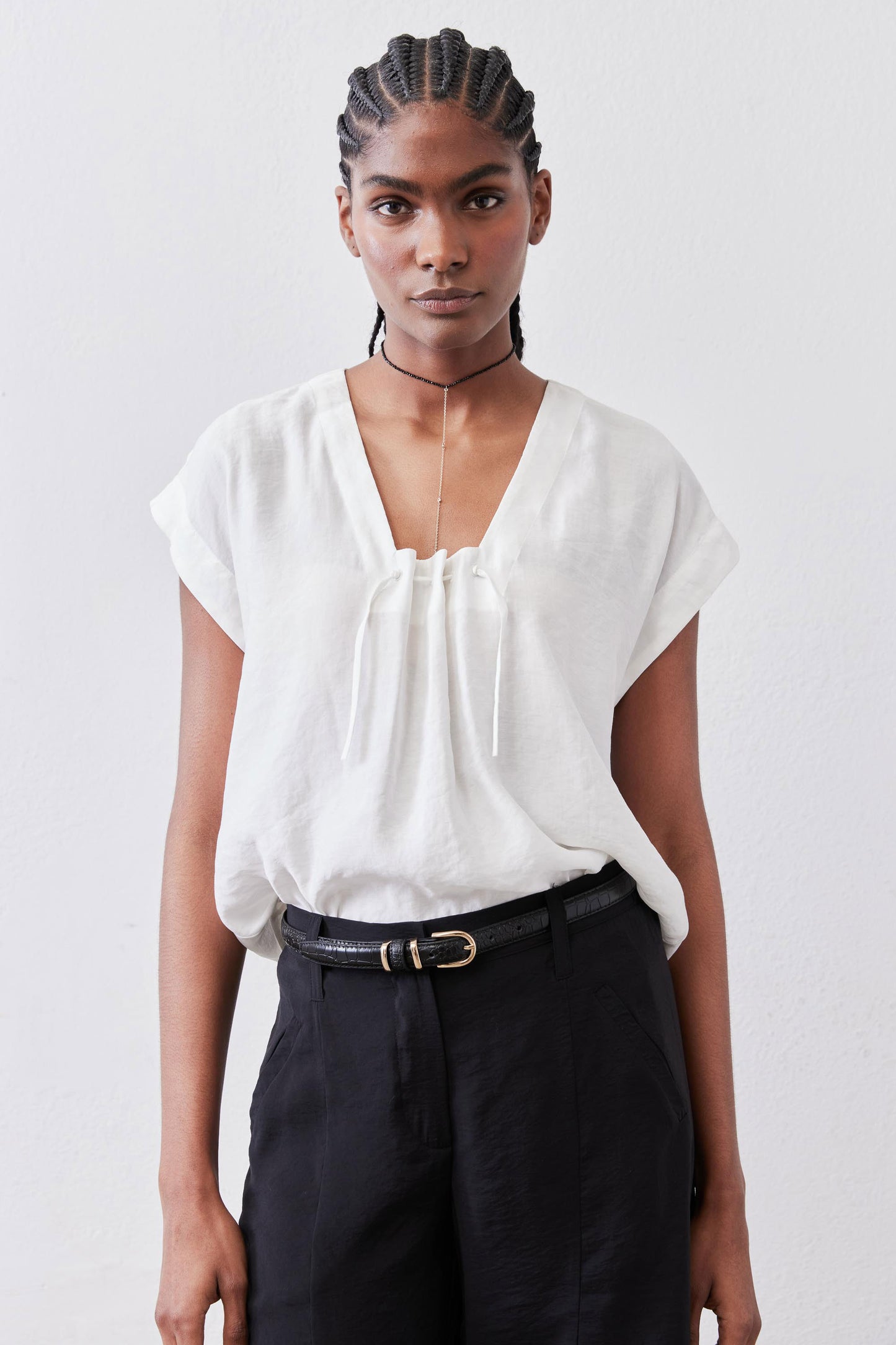 White poplin top with cinched neckline and drawstring, short sleeves