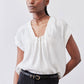 White light poplin top with cinched neckline and drawstring, short puff sleeves