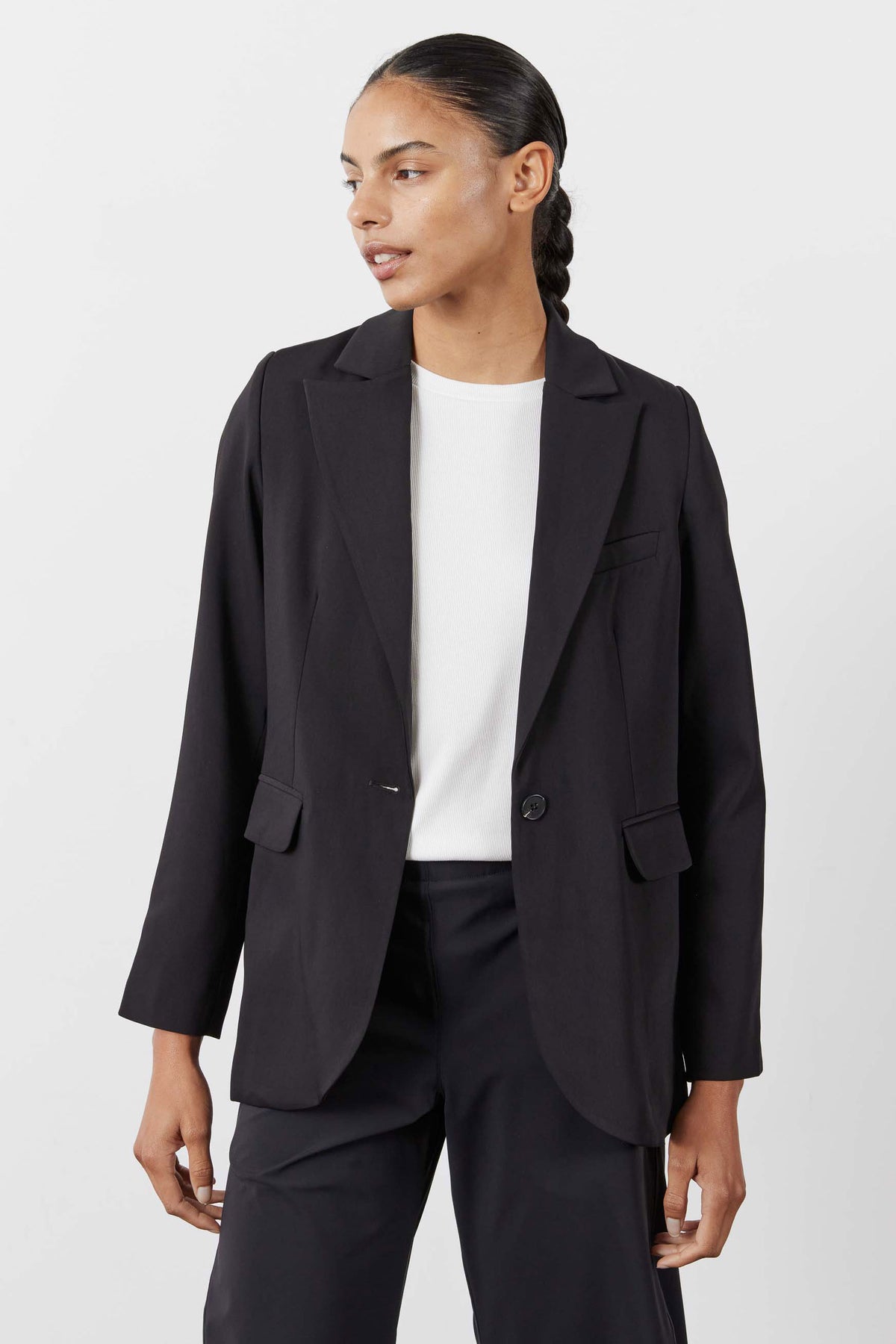 Petite black blazer with notch lapels and flap pockets, single front button