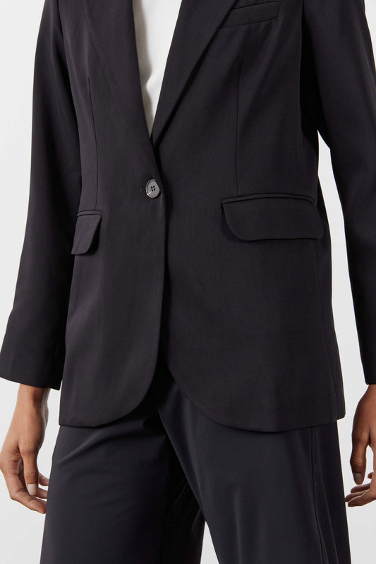 Black blazer front with two-button closure, notched lapels, and flap chest pocket