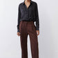 Dark brown high-rise wide-leg pants with pleats and black side stripe