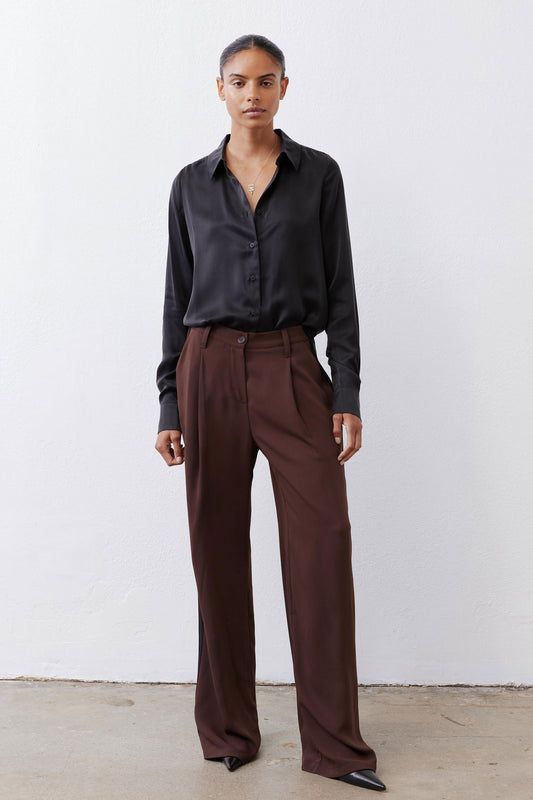 Dark brown high-rise wide-leg pants with pleats and black side stripe