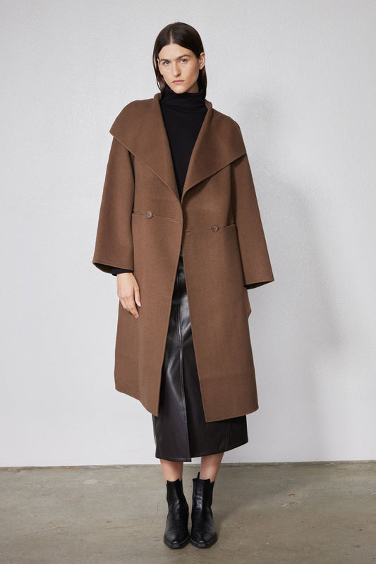 Dark taupe oversized collared wool coat with side pockets and button-front closure, front view