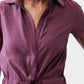 Maroon V-neck short-sleeve jumpsuit with drawstring tie at the waist