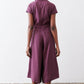 Maroon cropped jumpsuit with short sleeves and center back seam