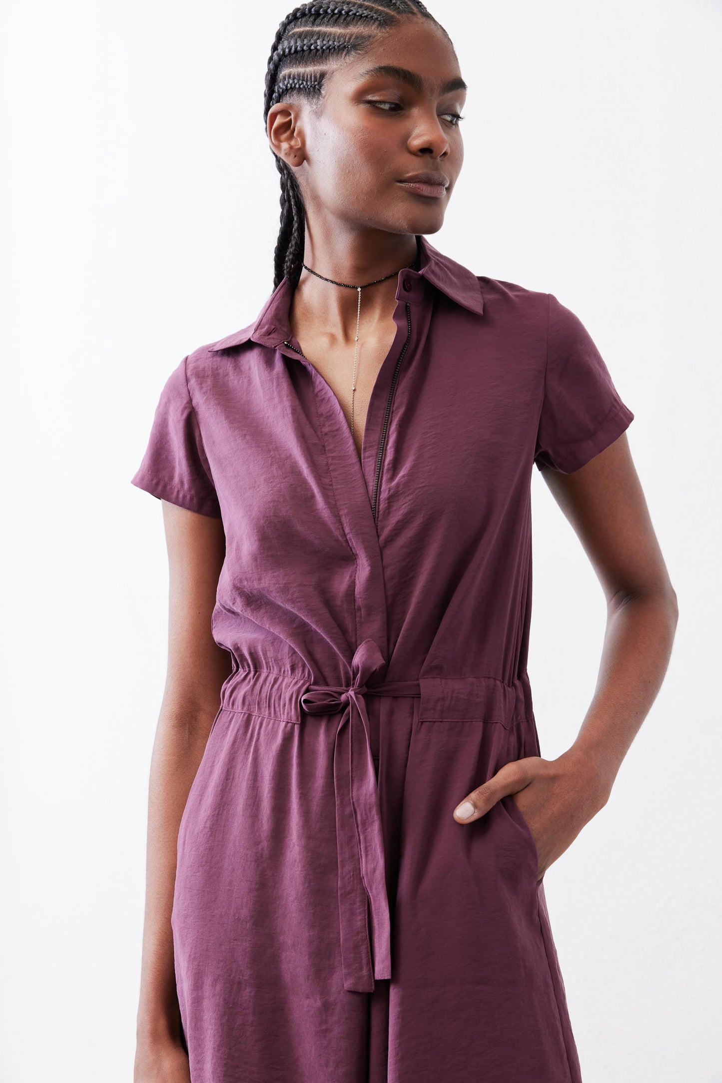 Maroon short-sleeve V-neck jumpsuit with drawstring waist and side pockets