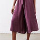 Maroon cropped jumpsuit with gathered waist and wide straight cropped legs
