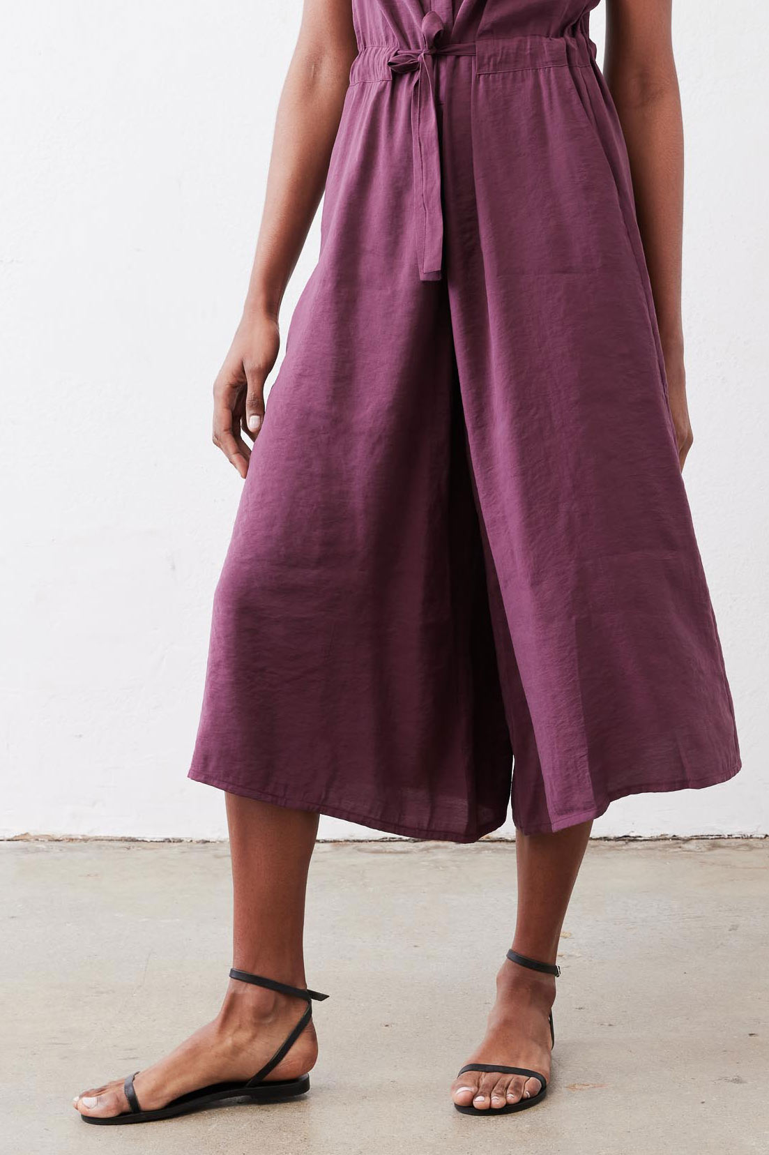 Maroon cropped jumpsuit with gathered waist and wide straight cropped legs