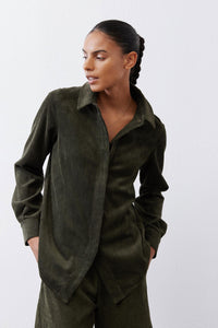 Olive corduroy zip-front top detail with spread collar and draped hem