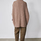 Taupe melange dolman cardigan back view with textured knit and relaxed long fit.