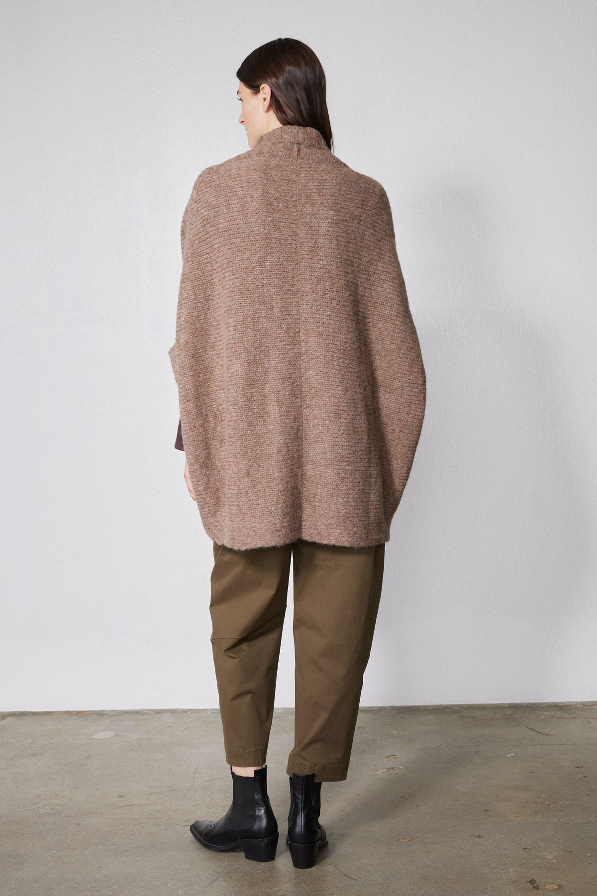 Taupe melange dolman cardigan back view with textured knit and relaxed long fit.
