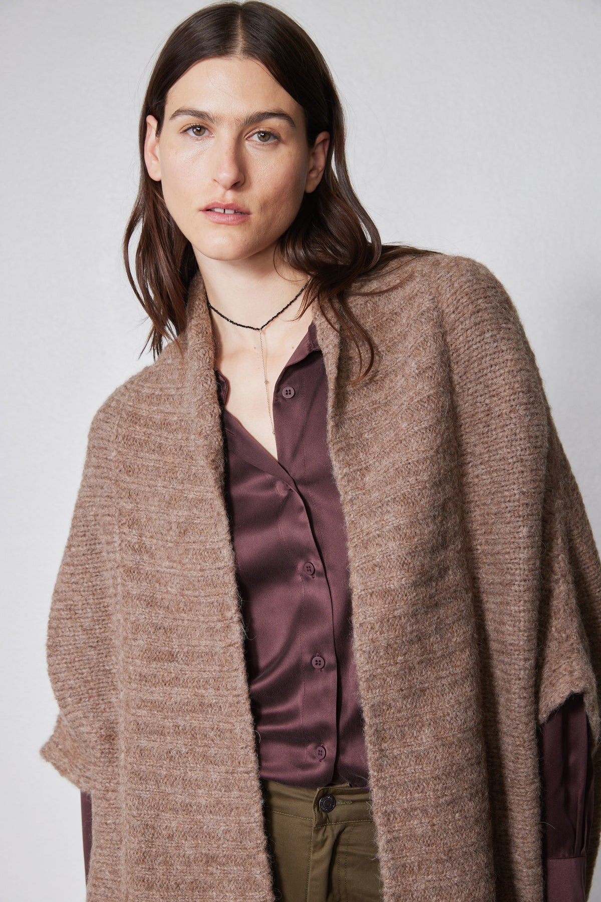 Taupe melange dolman cardigan neckline close-up with open front and textured knit.