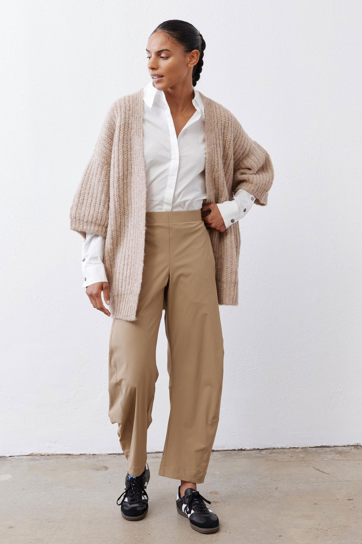 Oatmeal knit kimono cardigan with open front and long sleeves, textured ribbed cuffs