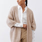 Oatmeal knit kimono cardigan with open neckline and buttoned sleeve cuffs