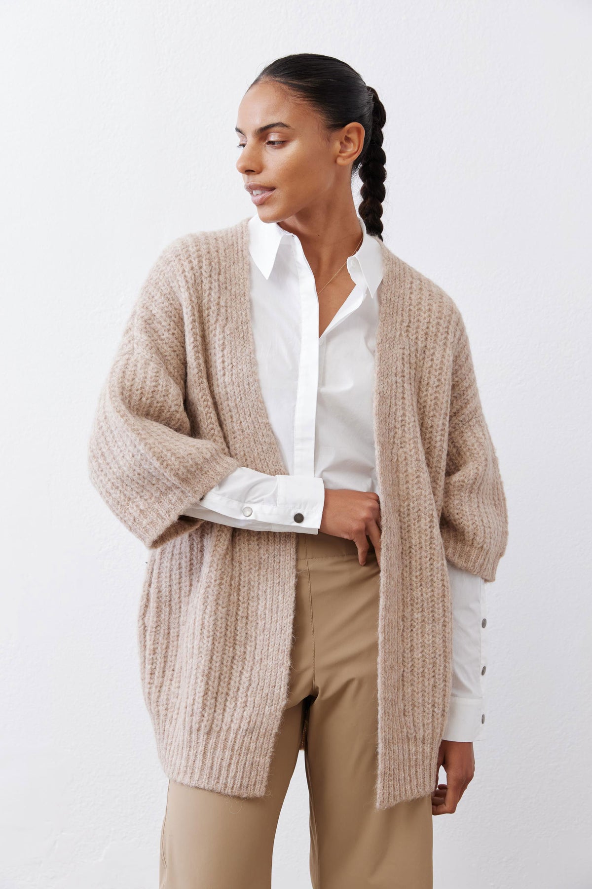 Oatmeal knit kimono cardigan with open neckline and buttoned sleeve cuffs
