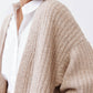 Oatmeal textured knit kimono cardigan sleeve with buttoned cuff and wide kimono shape