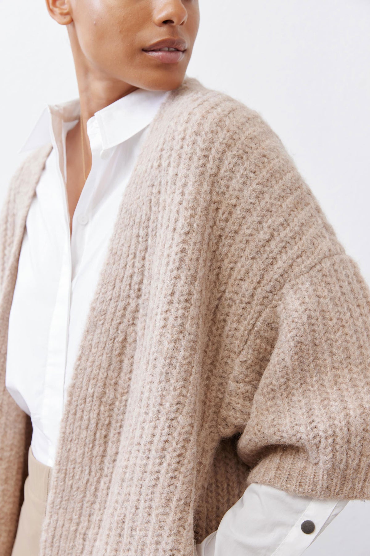 Oatmeal textured knit kimono cardigan sleeve with buttoned cuff and wide kimono shape