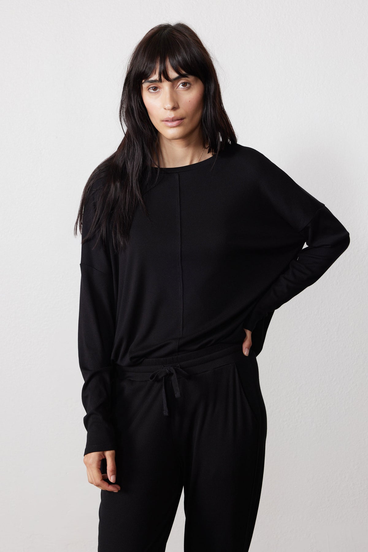 Black pajama set showing the relaxed top and drawstring waistband