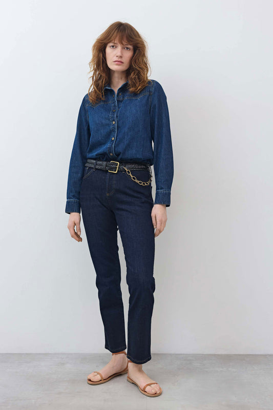 Dark wash straight crop jeans with mid-rise fit, cuffed straight legs, belt loops.