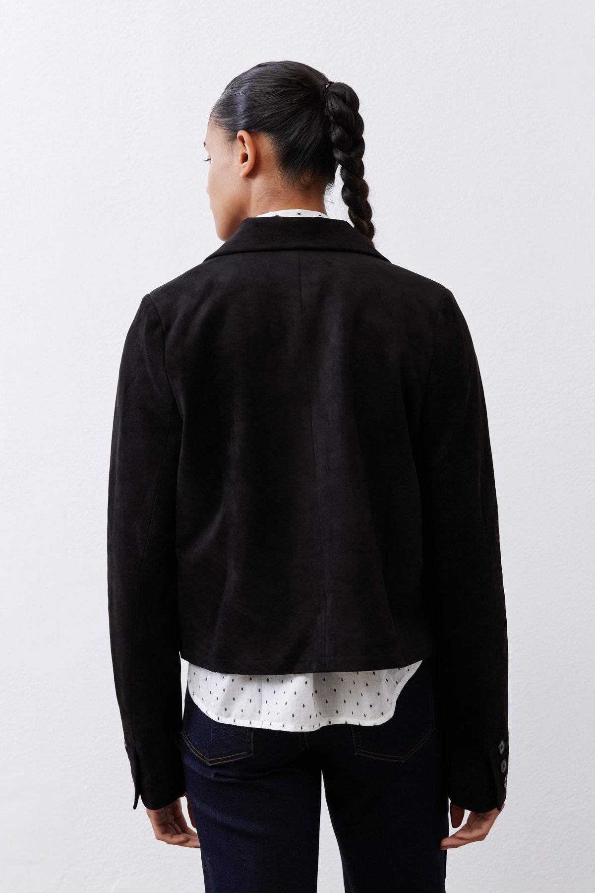 Black cropped suede jacket back view with stand collar and button closure