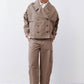 Oversized walnut nylon trench coat with double-breasted front and wide lapels