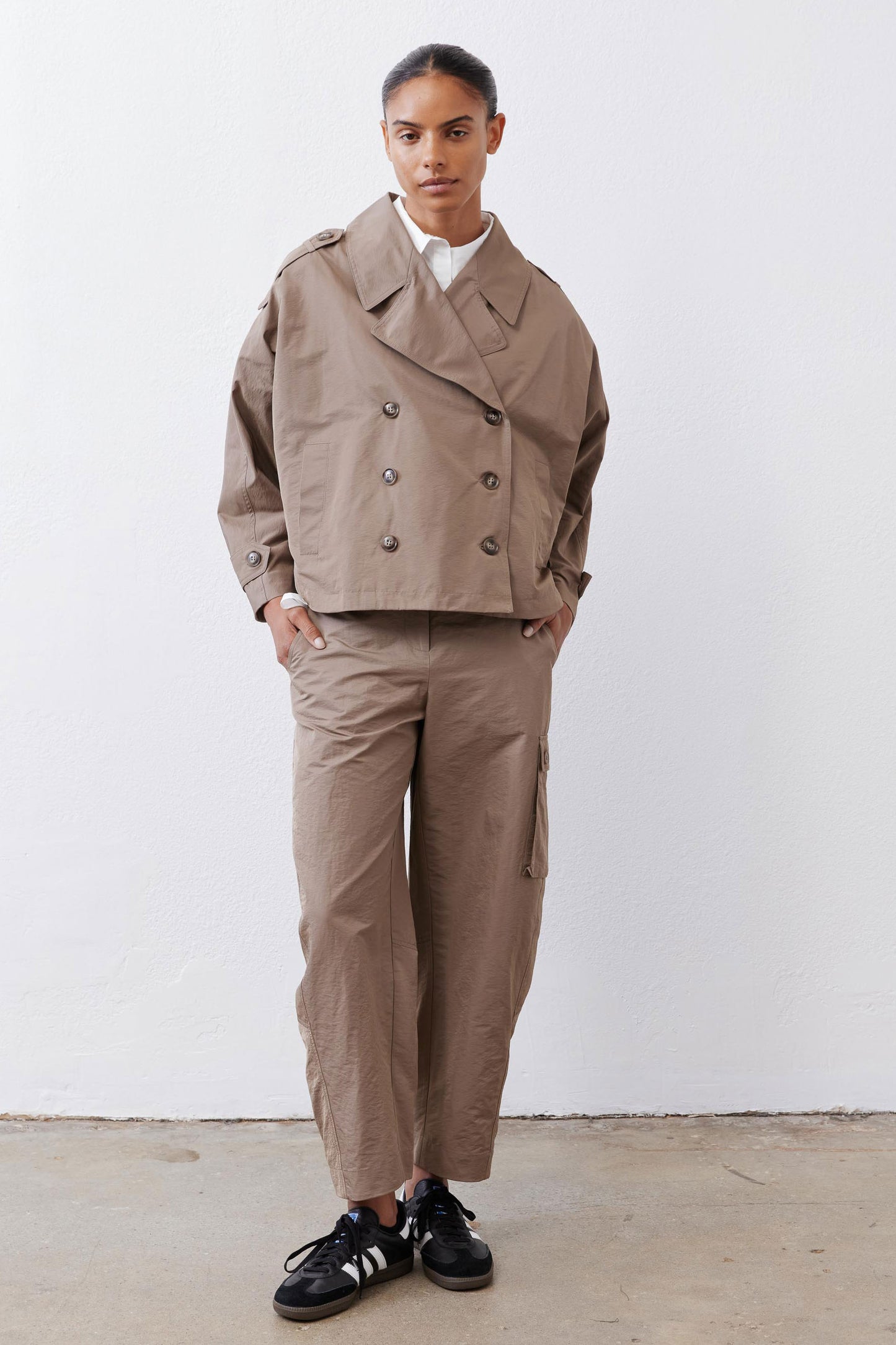 Walnut nylon trench coat with buttoned front and relaxed oversized shoulders