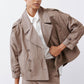 Walnut nylon trench coat close-up: lapels, double buttons, and flap pockets