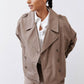 Walnut nylon trench coat close-up with open front, structured lapels, and buttons