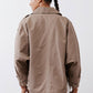 Walnut nylon trench coat back view with yoke and wide sleeves