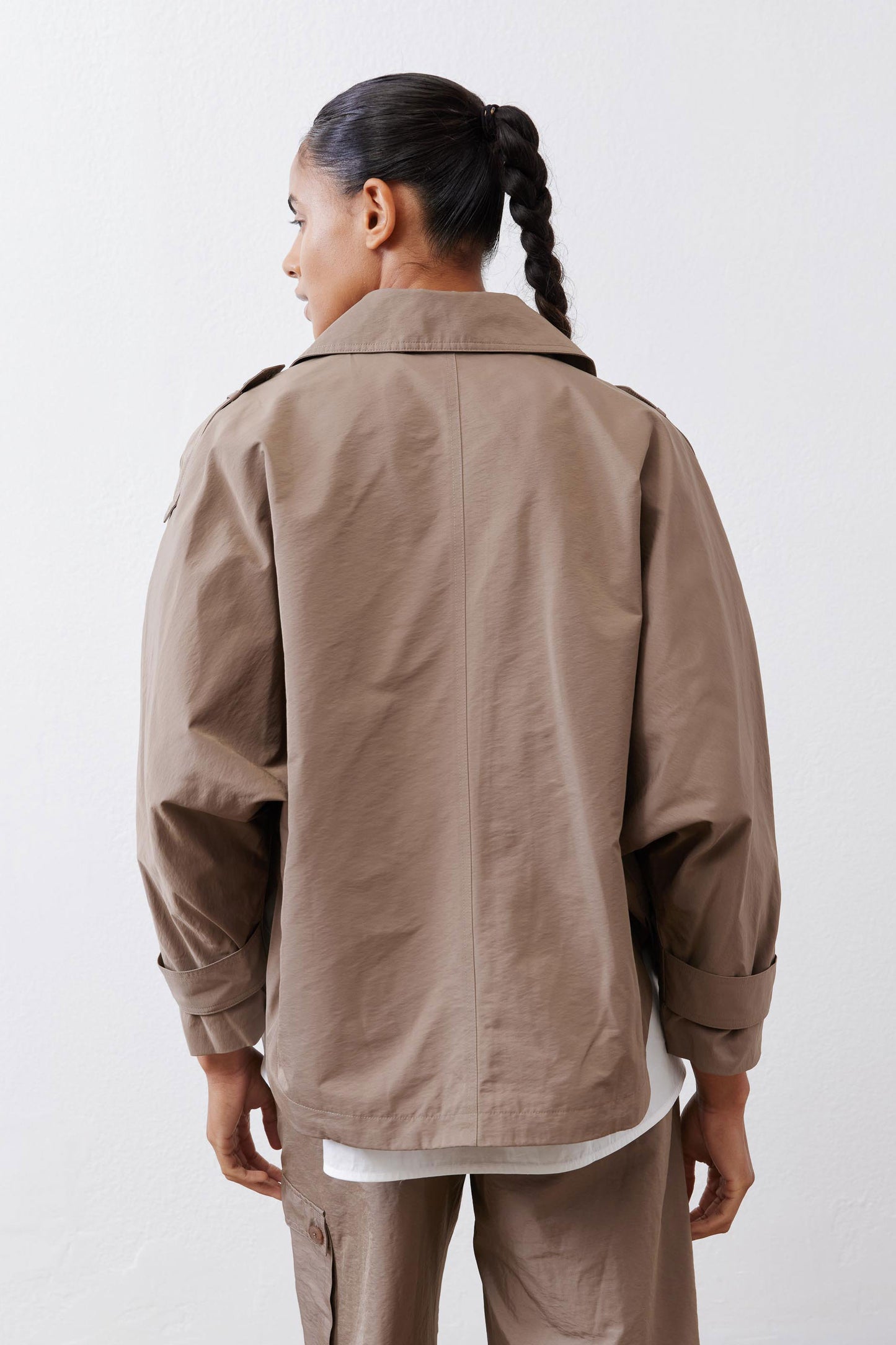 Walnut nylon trench coat back view with yoke and wide sleeves