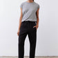 Black scuba pants with elastic drawstring waist and relaxed straight legs