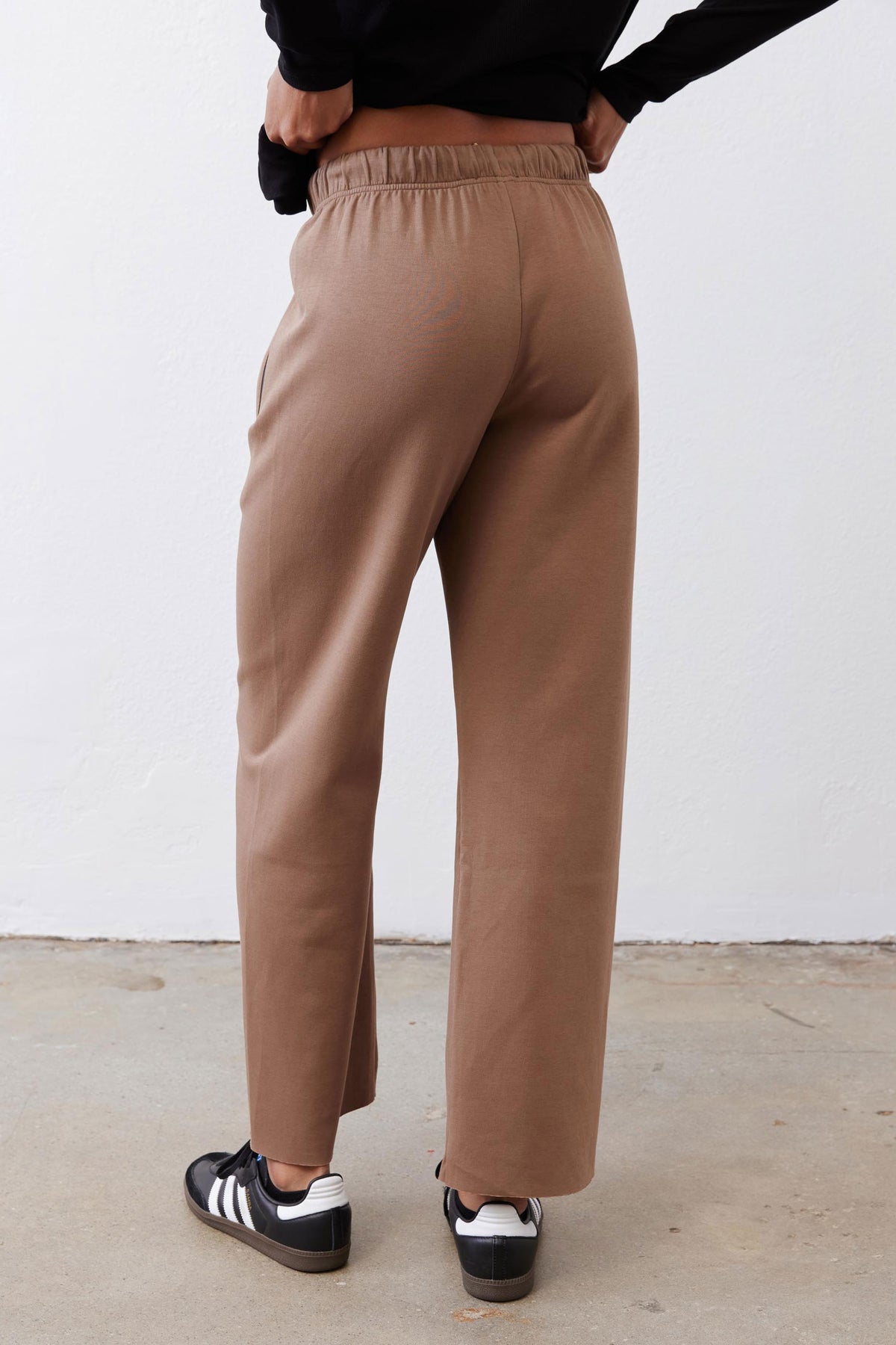 Fawn scuba pants back view, elastic waist and straight, clean leg lines