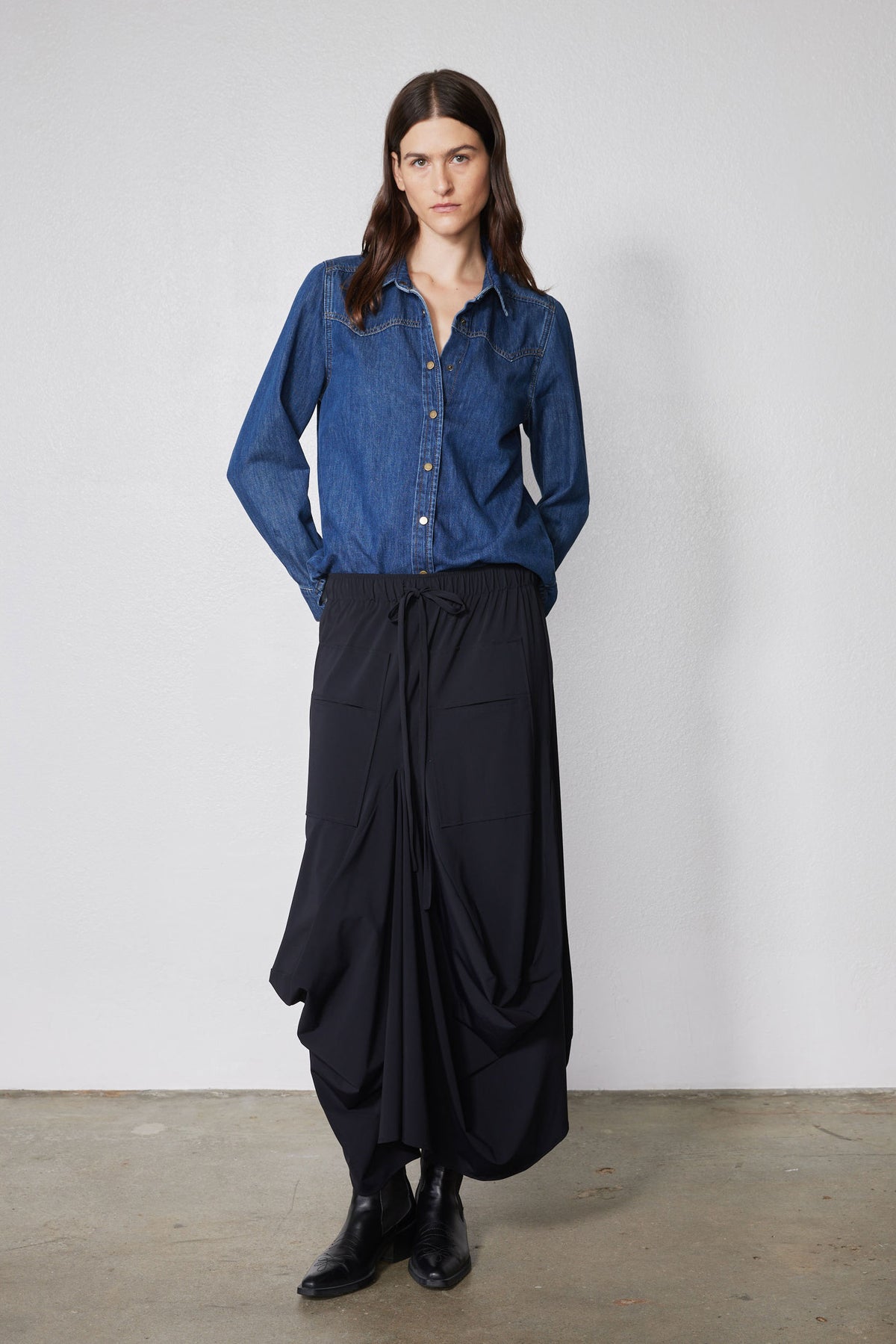 Blue denim button-front shirt with point collar and long sleeves, relaxed fit
