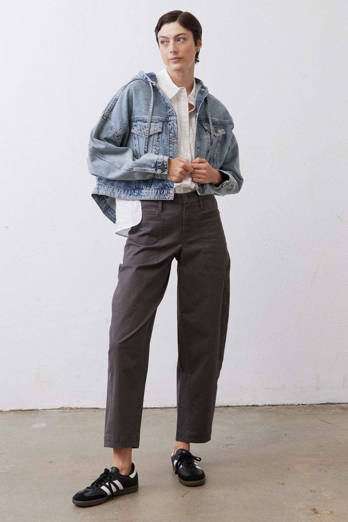 Washed blue denim jacket, hoodless with button front and two chest flap pockets