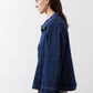 Denim cropped swing jacket, medium wash, side view with button cuff detail