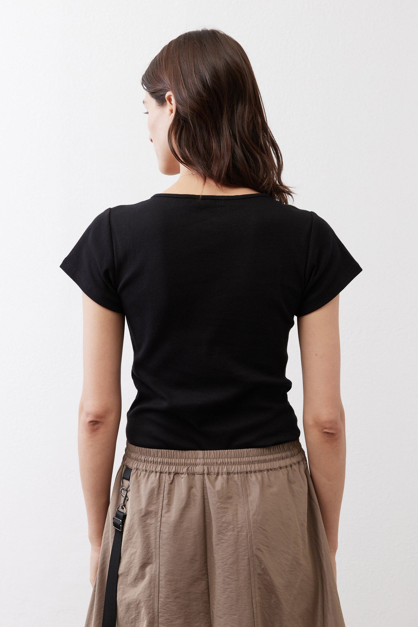 Black short-sleeve top, back view