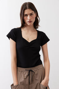 Black square-neck dipped front short-sleeve top with gathered neckline