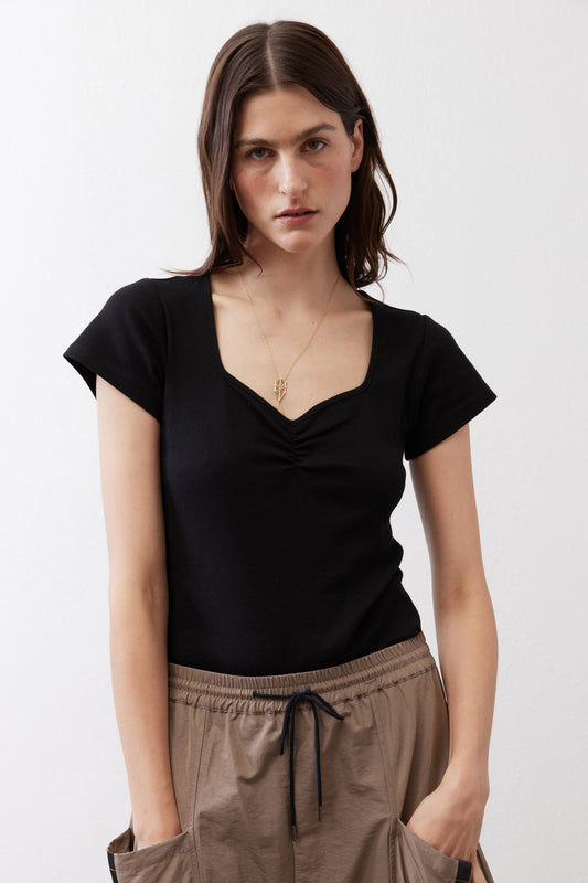 Black square-neck top with ruched V-style neckline and short sleeves