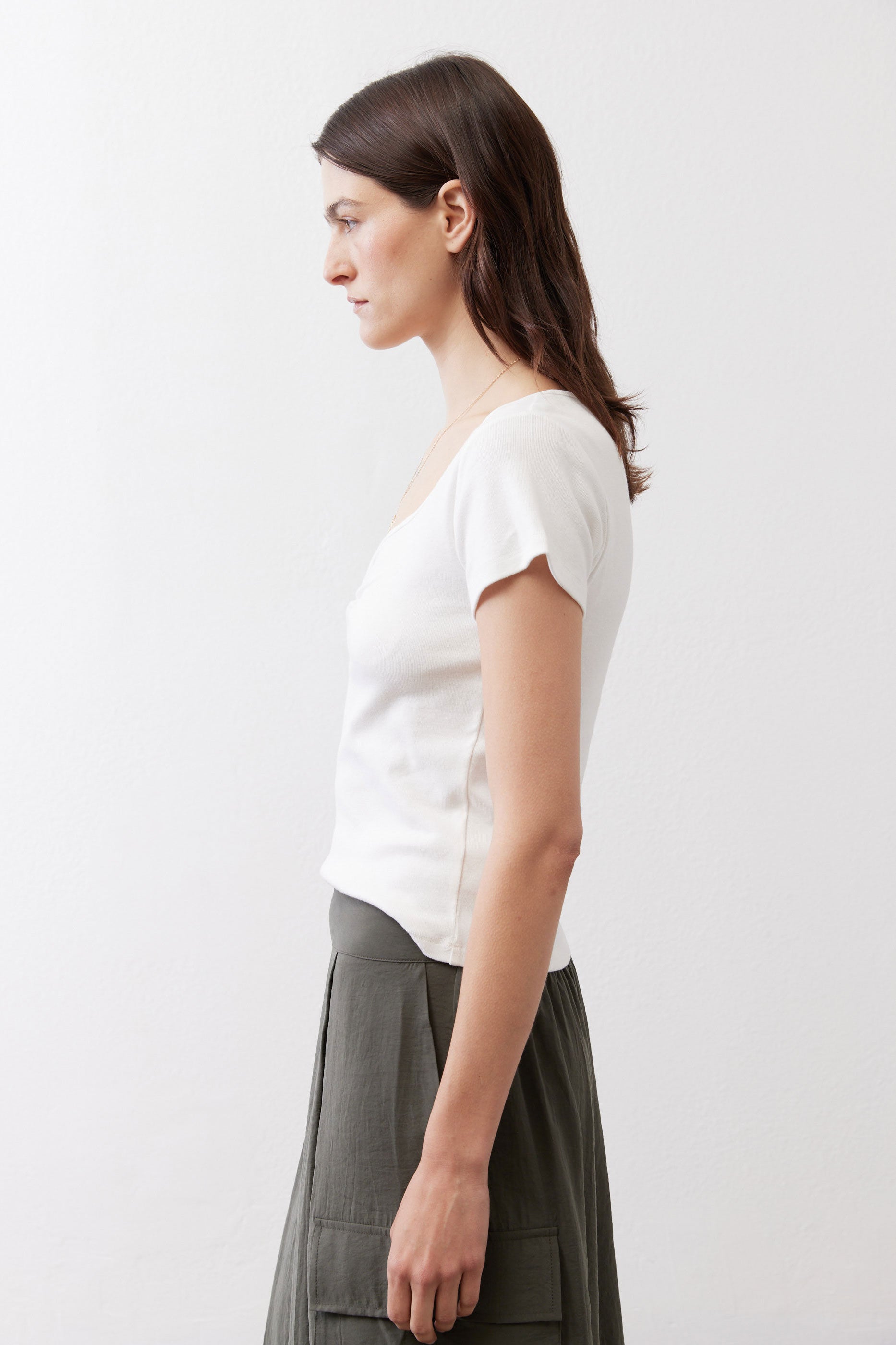 Ivory square-neck dipped top with short sleeves, side view