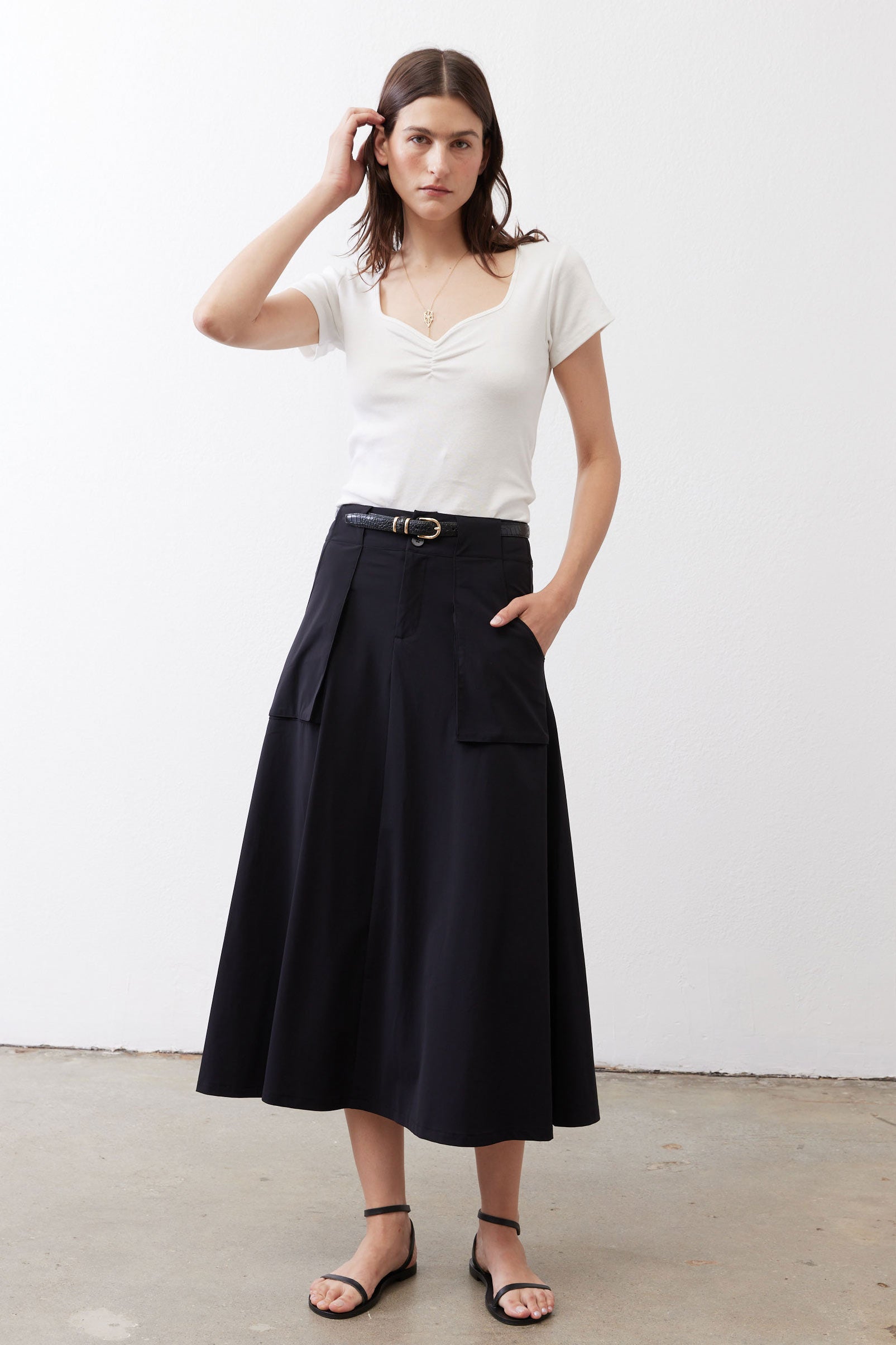 Ivory square-neck dipped top with short sleeves and gathered front bust detail