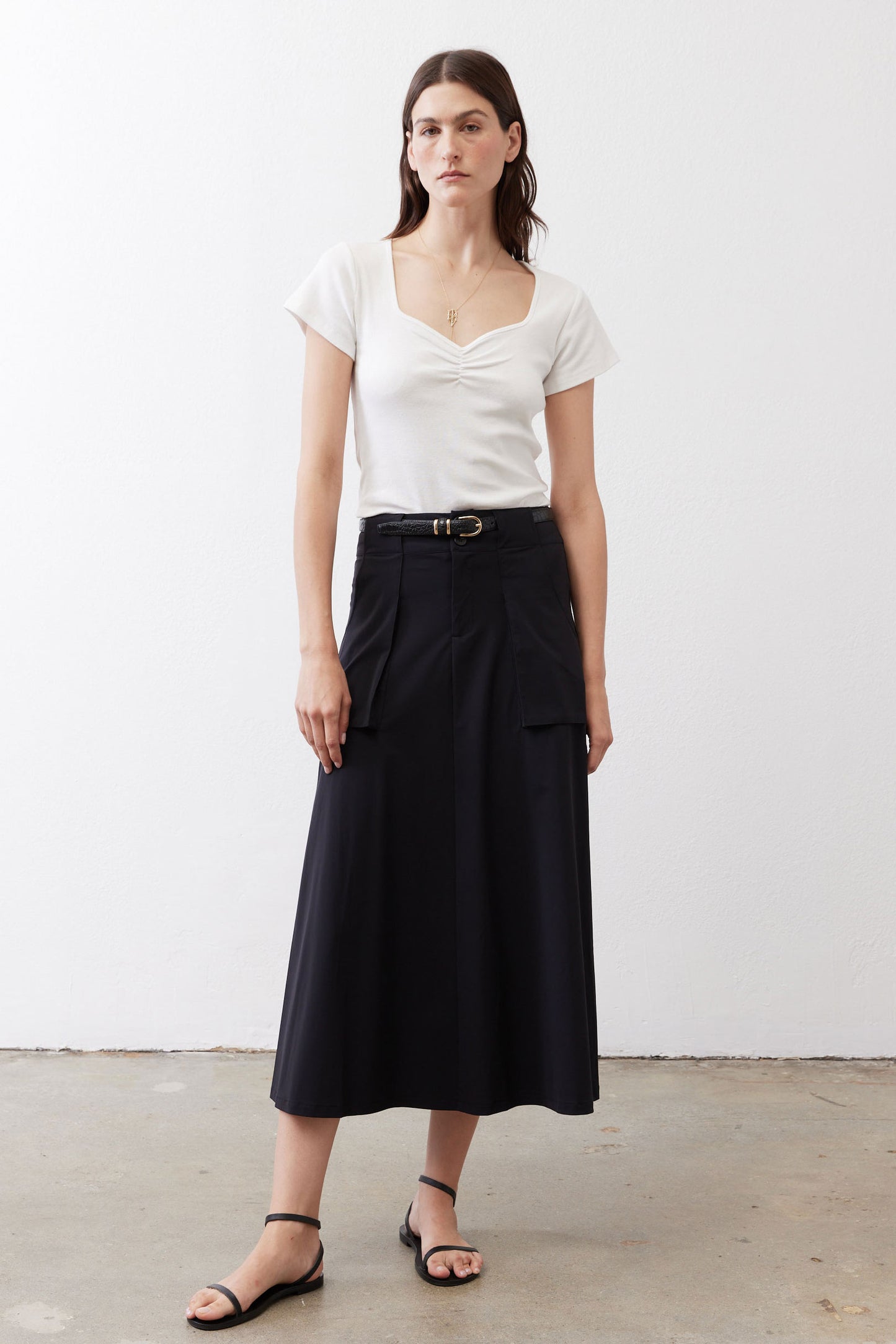 Ivory square-neck dipped top with short sleeves and gathered V-shaped bust detail
